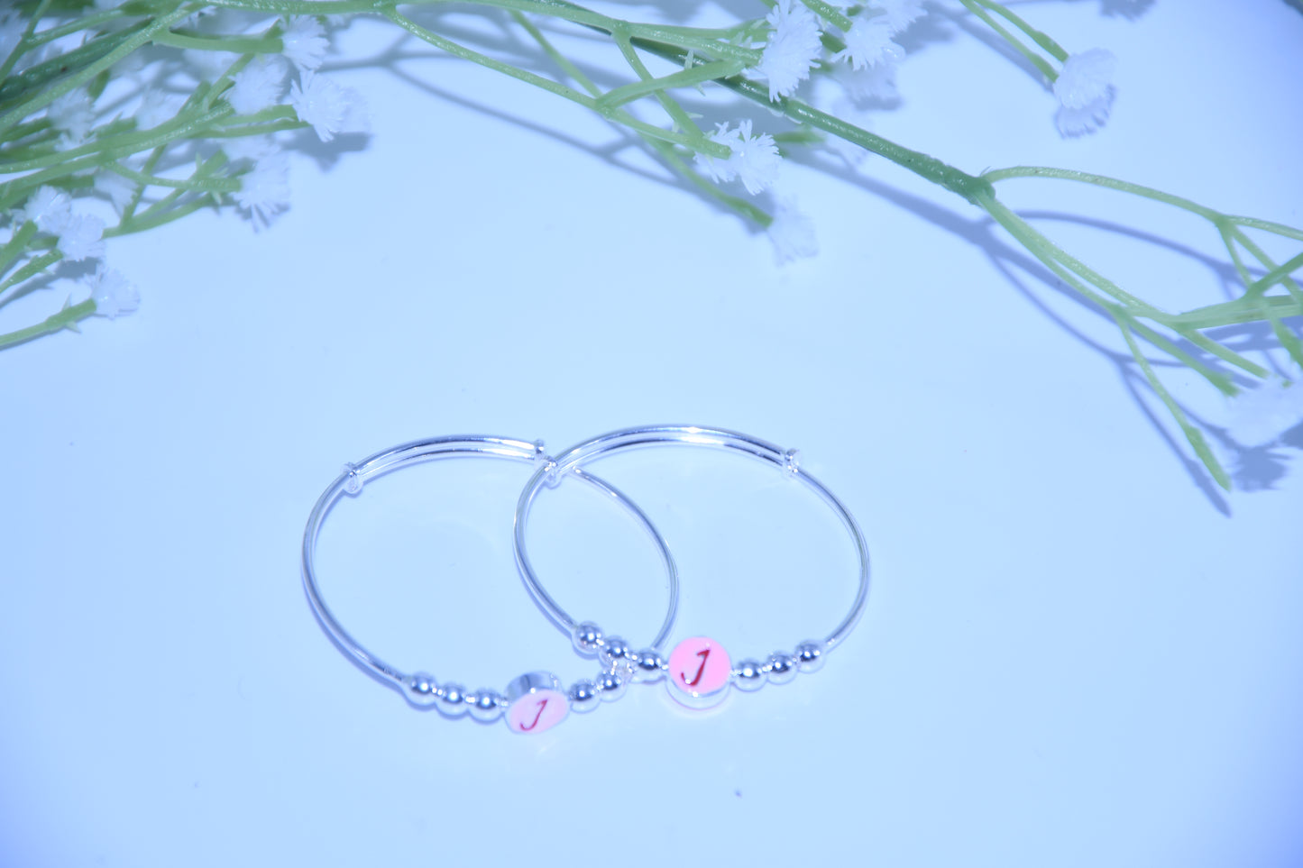 92.5 Silver Initial Pink‘J’ Kadas (Pair of 2)